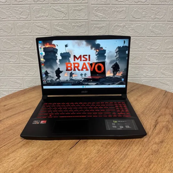 Ігровий ноутбук Б-клас MSI Bravo 15 B5ED / 15.6" (1920x1080) IPS / AMD Ryzen 7 5800H (8 (16) ядер по 3.2 - 4.4 GHz) / 16 GB DDR4 / 512 GB SSD NVMe / AMD Radeon RX 6550M, 4 GB GDDR6, 64-bit / WebCam б/в - зображення 2