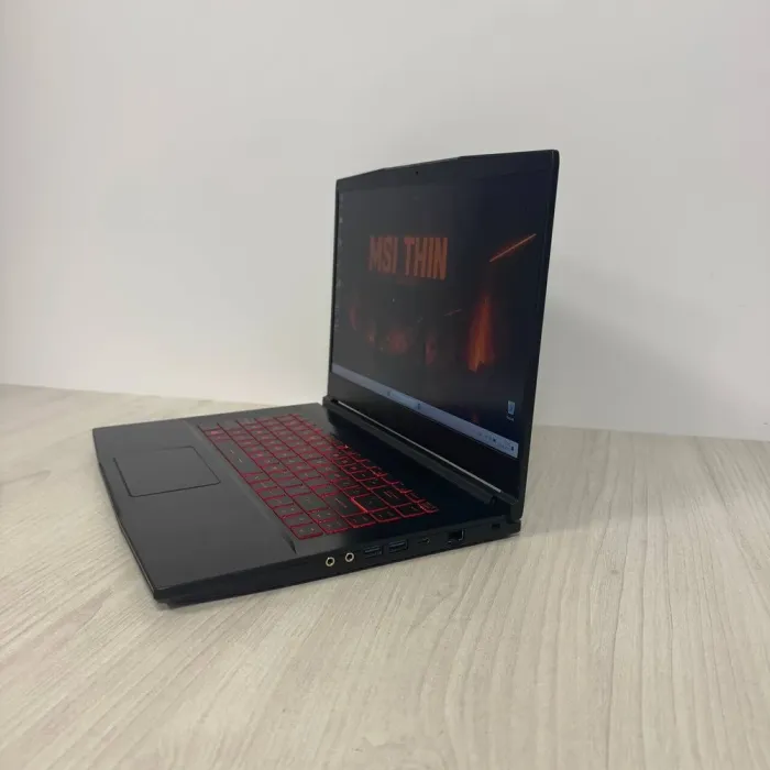Ігровий ноутбук Б-класу MSI GF63 Thin 11UC / 15.6" (1920x1080) IPS / Intel Core i5-11400H (6 (12) ядер по 2,7 - 4,5 ГГц) / 8 ГБ DDR4 / 512 ГБ SSD NVMe / nVidia GeForce RTX 3050, 4 ГБ GDDR6, 128-bit / WebCam б/в - зображення 5