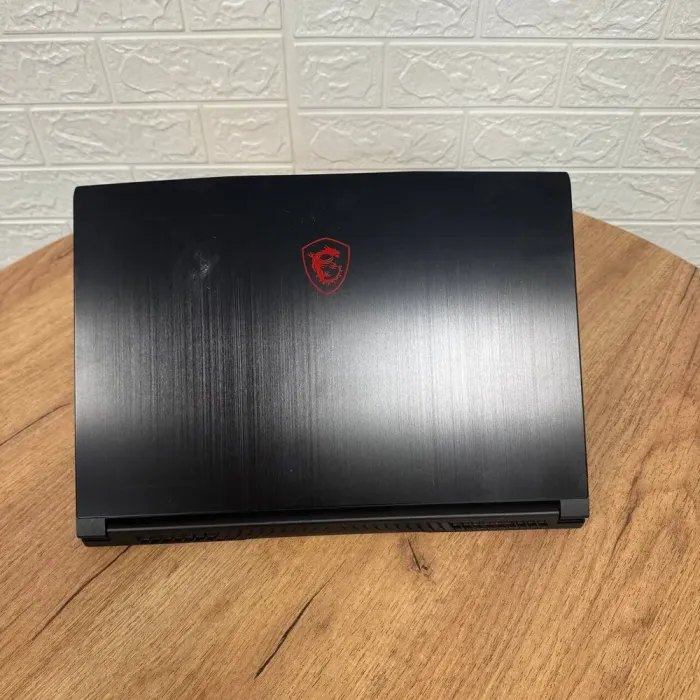 Ігровий ноутбук Б-клас MSI GF65 Thin 10UE / 15.6" (1920x1080) IPS / Intel Core i7-10750H (6 (12) ядер по 2.6 - 5.0 GHz) / 16 GB DDR4 / 512 GB SSD / nVidia GeForce RTX 3060, 6 GB GDDR6, 192-bit / WebCam б/в - зображення 3