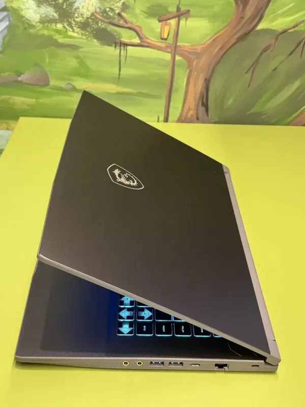 Ігровий ноутбук MSI Thin 15 B13vf / 15.6" (1920x1080) IPS / Intel Core i5-13420H (8 (12) ядер по 3,4 - 4,6 ГГц) / 16 ГБ DDR4 / 512 ГБ SSD / nVidia GeForce RTX 4060, 8 ГБ GDDR6, 128-bit / WebCam / HDMI б/в - зображення 7