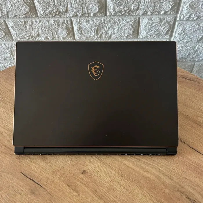 Ігровий ноутбук Б-клас MSI GS65 Stealth 8SF / 15.6" (1920x1080) IPS / Intel Core i7-8750H (6 (12) ядер по 2.2 - 4.1 GHz) / 32 GB DDR4 / 512 GB SSD / nVidia GeForce RTX 2060, 6 GB GDDR6, 192-bit / WebCam б/в - зображення 3