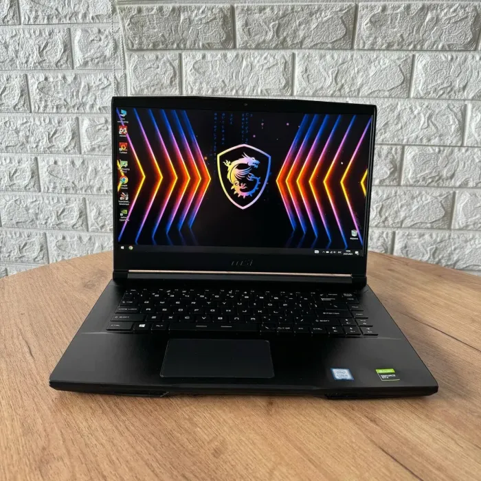 Ігровий ноутбук MSI GF63 Thin 9SCX / 15.6" (1920x1080) IPS / Intel Core i5-9300H (4 (8) ядра по 2.4 - 4.1 GHz) / 8 GB DDR4 / 512 GB SSD / nVidia GeForce GTX 1650 Max-Q, 4 GB GDDR6, 128-bit / WebCam б/в - зображення 2