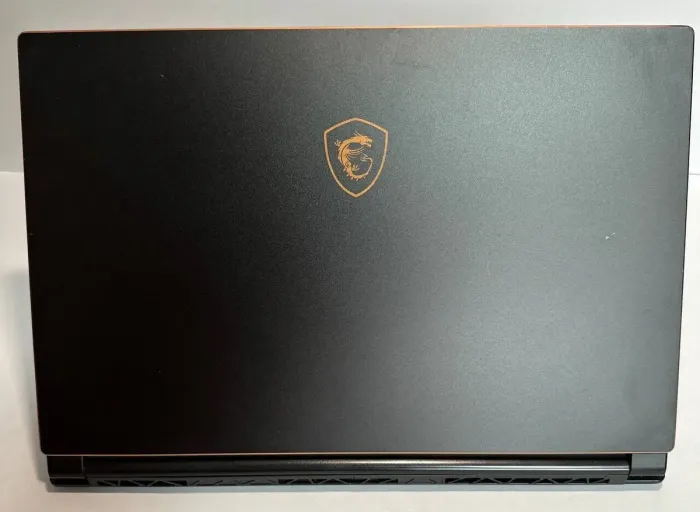 Ігровий ноутбук Б-клас MSI GS65 Stealth Thin 8RF / 15.6" (1920x1080) IPS / Intel Core i7-8750H (6 (12) ядер по 2.2 - 4.1 GHz) / 32 GB DDR4 / 512 GB SSD / nVidia GeForce GTX 1070 Max-Q, 8 GB GDDR5, 256-bit / WebCam / Win 11 Pro б/в - зображення 3