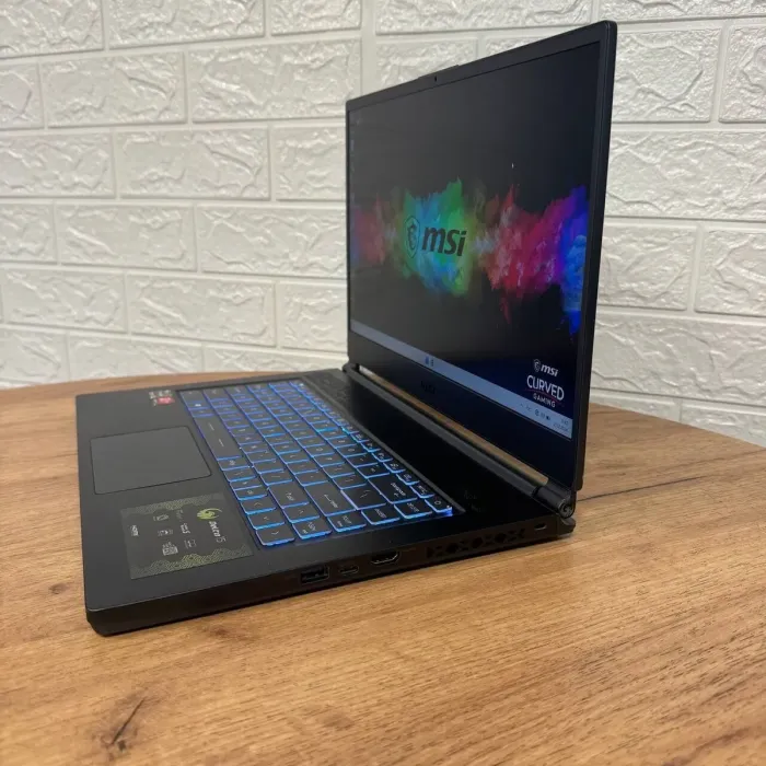 Ігровий ноутбук Б-клас MSI Delta 15 A5EFK / 15.6" (1920x1080) IPS / AMD Ryzen 7 5800H (8 (16) ядер по 3.2 - 4.4 GHz) / 16 GB DDR4 / 1000 GB SSD / AMD Radeon RX 6700M, 10 GB GDDR6, 160-bit / WebCam б/в - зображення 5