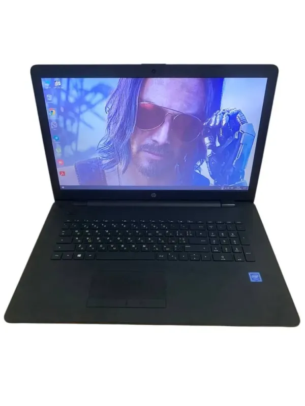Ноутбук HP 17-bs553ng / 17.3" (1600x900) TN / Intel Celeron N3060 (2 ядра по 1.6 - 2.48 GHz) / 8 GB DDR3 / 120 GB SSD / Intel HD Graphics 400 / WebCam / Win 10 Home б/в - зображення 2