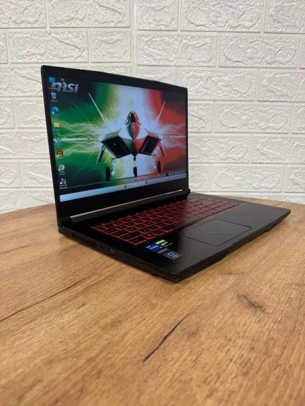 Ігровий ноутбук Б-клас MSI GV15 Thin 11SCV / 15.6" (1920x1080) IPS / Intel Core i5-11400H (6 (12) ядер по 2.7 - 4.5 GHz) / 8 GB DDR4 / 256 GB SSD / nVidia GeForce GTX 1650 Max-Q, 4 GB GDDR6, 128-bit / WebCam б/в - зображення 4