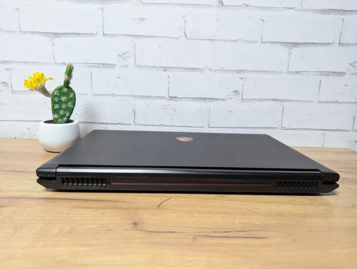 Ігровий ноутбук Б-клас MSI GP62 6QE MS-16J5 / 15.6" (1920x1080) TN / Intel Core i7-6700HQ (4 (8) ядра по 2.6 - 3.5 GHz) / 16 GB DDR4 / 256 GB SSD + 1000 GB HDD / nVidia GeForce GTX 960M, 4 GB GDDR5, 128-bit / WebCam / DVD-ROM б/в - зображення 8