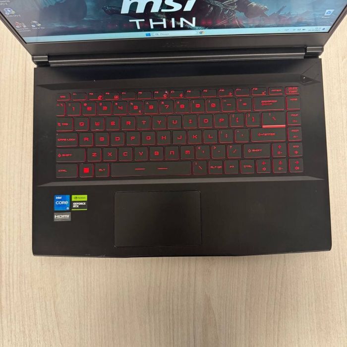 Ігровий ноутбук Б-класу MSI GF63 Thin 11UC / 15.6" (1920x1080) IPS / Intel Core i5-11400H (6 (12) ядер по 2,7 - 4,5 ГГц) / 16 ГБ DDR4 / 512 ГБ SSD NVMe / nVidia GeForce RTX 3050, 4 ГБ GDDR6, 128-bit / WebCam б/в - зображення 7