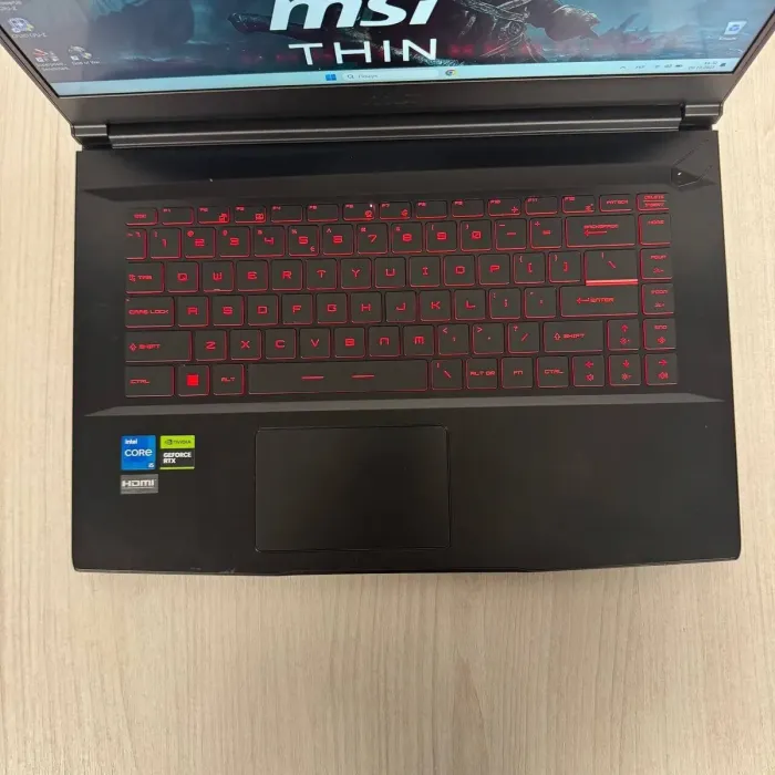 Ігровий ноутбук Б-класу MSI GF63 Thin 11UC / 15.6" (1920x1080) IPS / Intel Core i5-11400H (6 (12) ядер по 2,7 - 4,5 ГГц) / 16 ГБ DDR4 / 512 ГБ SSD NVMe / nVidia GeForce RTX 3050, 4 ГБ GDDR6, 128-bit / WebCam б/в - зображення 7