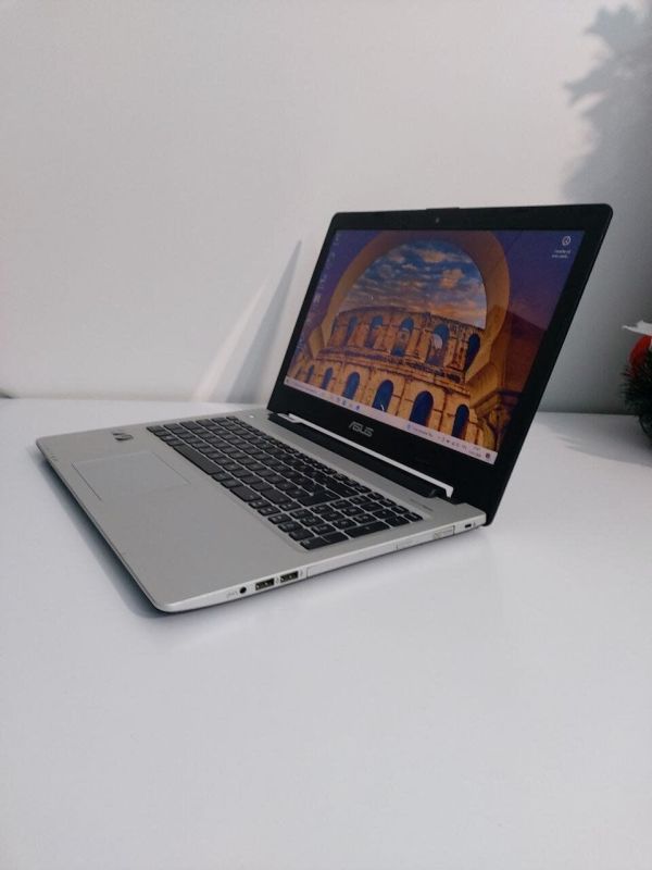 Ноутбук Б-клас Asus K56CM / 15.6" (1366x768) TN / Intel Core i5-3317U (2 (4) ядра по 1.7 - 2.6 GHz) / 12 GB DDR3 / 240 GB SSD / nVidia GeForce GT 635M, 2 GB GDDR3, 128-bit / WebCam / DVD-ROM б/в - изображение 5