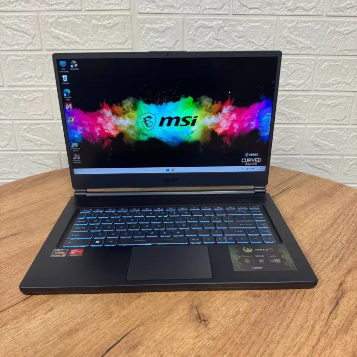Ігровий ноутбук Б-клас MSI Delta 15 A5EFK / 15.6" (1920x1080) IPS / AMD Ryzen 7 5800H (8 (16) ядер по 3.2 - 4.4 GHz) / 16 GB DDR4 / 1000 GB SSD / AMD Radeon RX 6700M, 10 GB GDDR6, 160-bit / WebCam б/в - зображення 2