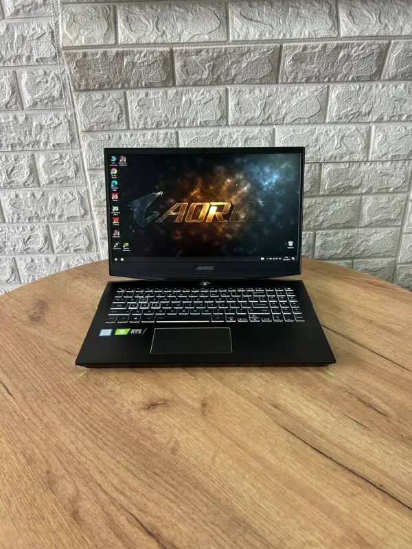 Ігровий ноутбук Б-клас Gigabyte Aorus 15-X9 / 15.6" (1920x1080) IPS / Intel Core i7-8750H (6 (12) ядер по 2.2 - 4.1 GHz) / 16 GB DDR4 / 512 GB SSD / nVidia GeForce RTX 2070, 8 GB GDDR6, 256-bit / WebCam б/в - зображення 2