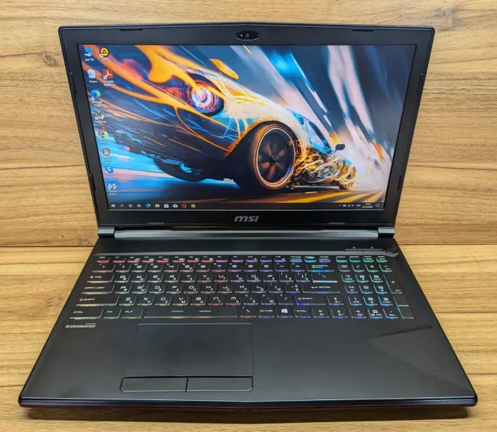 Ігровий ноутбук MSI MS16P7 GL63 9SDK / 15.6" (1920x1080) IPS / Intel Core i7-9750H (6 (12) ядер по 2.6 - 4.5 GHz) / 16 GB DDR4 / 512 GB SSD / nVidia GeForce GTX 1660 Ti, 6 GB GDDR6, 192-bit / WebCam / Windows 10 б/в - зображення 2