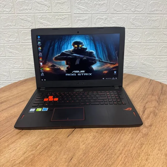 Ігровий ноутбук Б-клас Asus ROG Strix GL502VM / 15.6" (1920x1080) IPS / Intel Core i7-7700HQ (4 (8) ядра по 2.8 - 3.8 GHz) / 12 GB DDR4 / 500 GB SSD / nVidia GeForce GTX 1060, 3 GB GDDR5, 192-bit / WebCam б/в - зображення 2