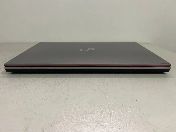 Мобільна робоча станція Fujitsu Celsius H760 / 15.6" (1920x1080) IPS / Intel Core i7-6820HQ (4 (8) ядра по 2.7 - 3.6 GHz) / 32 GB DDR4 / 256 GB SSD / nVidia Quadro M1000M, 2 GB GDDR5, 128-bit / WebCam / DVD-ROM б/в - зображення 6