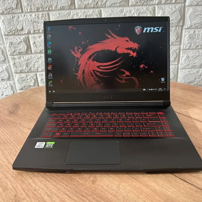 Ігровий ноутбук MSI GF65 Thin 10UE / 15.6" (1920x1080) IPS / Intel Core i5-10500H (6 (12) ядер по 2.5 - 4.5 GHz) / 16 GB DDR4 / 512 GB SSD / nVidia GeForce RTX 3060, 6 GB GDDR6, 192-bit / WebCam б/в - зображення 2