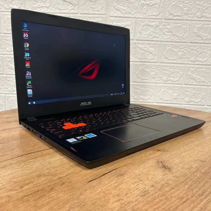 Ігровий ноутбук Б-клас Asus ROG Strix GL502VT / 15.6" (1920x1080) TN / Intel Core i7-6700HQ (4 (8) ядра по 2.6 - 3.5 GHz) / 12 GB DDR4 / 256 GB SSD NVMe + 1000 GB HDD / nVidia GeForce GTX 970M, 3 GB GDDR5, 192-bit / WebCam б/в - зображення 4