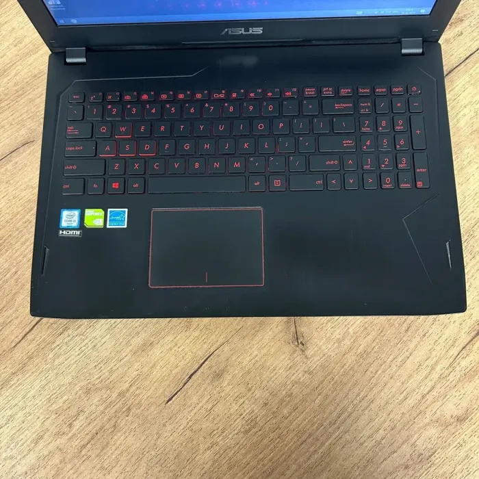 Ігровий ноутбук Asus FX502VM / 15.6" (1920x1080) TN / Intel Core i5-6300HQ (4 ядра по 2.3 - 3.2 GHz) / 16 GB DDR4 / 128 GB SSD M.2 + 1000 GB HDD / nVidia GeForce GTX 1060, 3 GB GDDR5, 192-bit / WebCam б/в - зображення 7