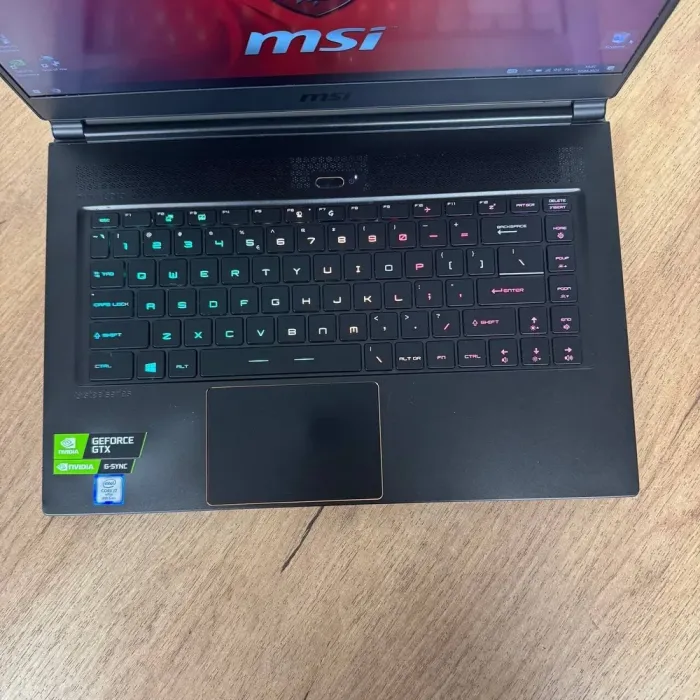 Ігровий ноутбук Б-клас MSI GS65 8RF Stealth Thin / 15.6" (1920x1080) IPS / Intel Core i7-8750H (6 (12) ядер по 2.2 - 4.1 GHz) / 32 GB DDR4 / 512 GB SSD / nVidia GeForce GTX 1070 Max-Q, 8 GB GDDR5, 256-bit / WebCam б/в - зображення 7
