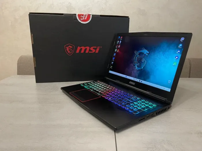 Ігровий ноутбук MSI Raider GE63 RGB 9SG / 15.6" (1920x1080) IPS / Intel Core i7-9750H (6 (12) ядер по 2.6 - 4.5 GHz) / 32 GB DDR4 / 512 GB SSD + 1000 GB HDD / nVidia GeForce RTX 2080, 8 GB GDDR6, 256-bit / WebCam б/в - зображення 6