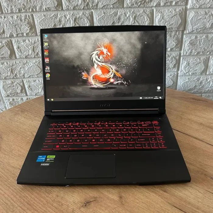 Ігровий ноутбук Б-клас MSI GF63 Thin 11UC / 15.6" (1920x1080) IPS / Intel Core i5-11400H (6 (12) ядер по 2.7 - 4.5 GHz) / 16 GB DDR4 / 512 GB SSD / nVidia GeForce RTX 3050, 4 GB GDDR6, 128-bit / WebCam б/в - зображення 2