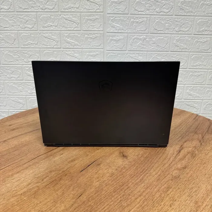 Мобільна робоча станція Б-клас MSI WS66 10TKT / 15.6" (1920x1080) IPS Touch / Intel Core i7-10875H (8 (16) ядер по 2.3 - 5.1 GHz) / 32 GB DDR4 / 1000 GB SSD / nVidia Quadro RTX 3000, 6 GB GDDR6, 192-bit / WebCam б/в - зображення 3