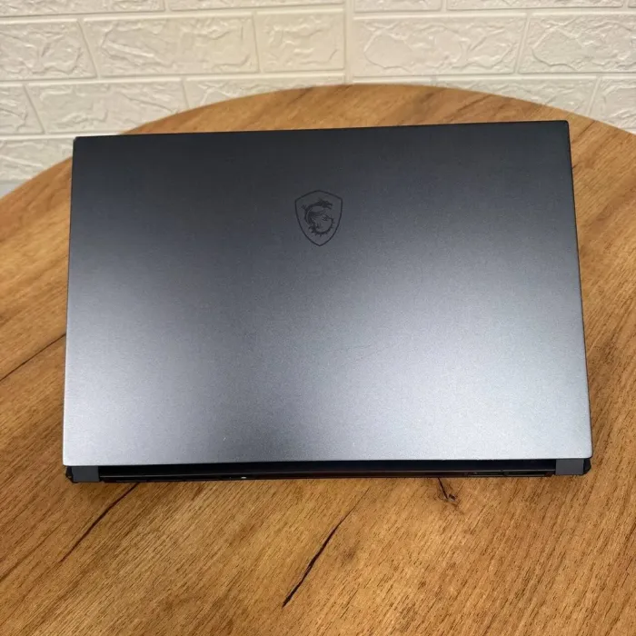 Мобільна робоча станція Б-клас MSI WS66 10TKT / 15.6" (1920x1080) IPS Touch / Intel Core i9-10980HK (8 (16) ядер по 2.4 - 5.3 GHz) / 16 GB DDR4 / 512 GB SSD NVMe / nVidia Quadro RTX 3000, 6 GB GDDR6, 192-bit / WebCam б/в - зображення 3