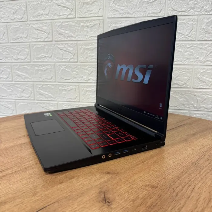 Ігровий ноутбук MSI GF63 Thin 10SC / 15.6" (1920x1080) IPS / Intel Core i5-10500H (6 (12) ядер по 2.5 - 4.5 GHz) / 16 GB DDR4 / 128 GB SSD NVMe + 1000 GB HDD / nVidia GeForce GTX 1650 Max-Q, 4 GB GDDR6, 128-bit / WebCam б/в - зображення 5