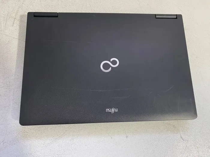 Мобільна робоча станція Fujitsu Celsius H910 / 17.3" (1920x1080) TN / Intel Core i7-2920XM (4 (8) ядра по 2.5 - 3.6 GHz) / 32 GB DDR3 / 256 GB SSD + 500 GB HDD / nVidia Quadro 4000M, 2 GB GDDR5, 256-bit / WebCam б/в - зображення 7