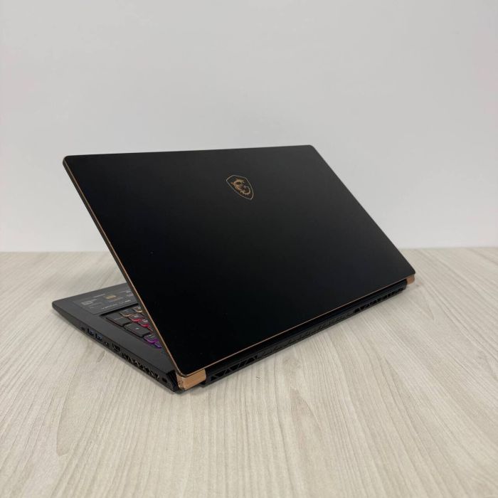 Ігровий ноутбук Б-клас MSI GS75 Stealth 10SE / 17.3" (1920x1080) IPS / Intel Core i7-10875H (8 (16) ядер по 2.3 - 5.1 GHz) / 16 GB DDR4 / 512 GB SSD NVMe / nVidia GeForce RTX 2060, 6 GB GDDR6, 192-bit / WebCam б/в - зображення 6