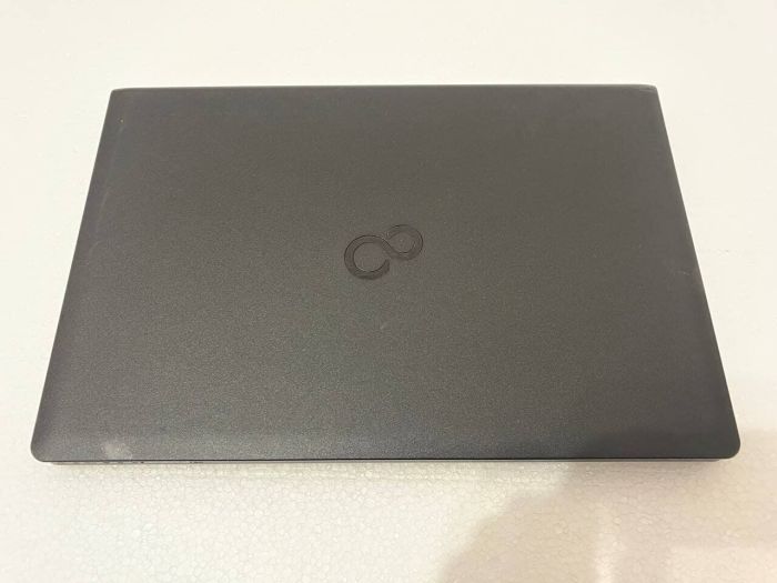 Ноутбук Fujitsu LifeBook A557 / 15.6" (1920x1080) IPS / Intel Core i5-7200U (2 (4) ядра по 2.5 - 3.1 GHz) / 8 GB DDR4 / 250 GB SSD / Intel HD Graphics 620 / WebCam / DVD-ROM б/в - зображення 8