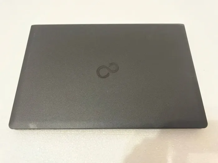 Ноутбук Fujitsu LifeBook A557 / 15.6" (1920x1080) IPS / Intel Core i5-7200U (2 (4) ядра по 2.5 - 3.1 GHz) / 8 GB DDR4 / 250 GB SSD / Intel HD Graphics 620 / WebCam / DVD-ROM б/в - зображення 8