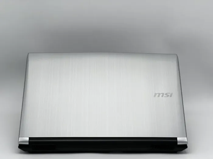 Ігровий ноутбук MSI GL62M 7RD / 15.6" (1920x1080) IPS / Intel Core i7-7700HQ (4 (8) ядра по 2,8 - 3,8 ГГц) / 16 ГБ DDR4 / 128 ГБ SSD + 1000 ГБ HDD / nVidia GeForce GTX 1050, 2 ГБ GDDR5, 128-біт / WebCam / HDMI б/в - зображення 5