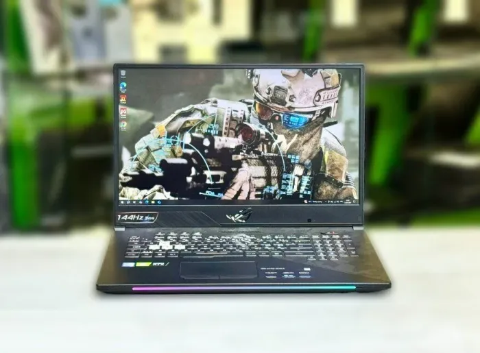 Ігровий ноутбук Б-клас Asus ROG StrixGL704G / 17.3" (1920x1080) IPS / Intel Core i7-8750H (6 (12) ядер по 2.2 - 4.1 GHz) / 32 GB DDR4 / 512 GB SSD M.2 / nVidia GeForce RTX 2060, 6 GB GDDR6, 192-bit / WebCam / Win 10 Home б/в - зображення 2