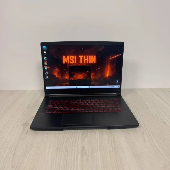 Ігровий ноутбук Б-класу MSI GF63 Thin 11UC / 15.6" (1920x1080) IPS / Intel Core i5-11400H (6 (12) ядер по 2,7 - 4,5 ГГц) / 8 ГБ DDR4 / 512 ГБ SSD NVMe / nVidia GeForce RTX 3050, 4 ГБ GDDR6, 128-bit / WebCam б/в - зображення 2
