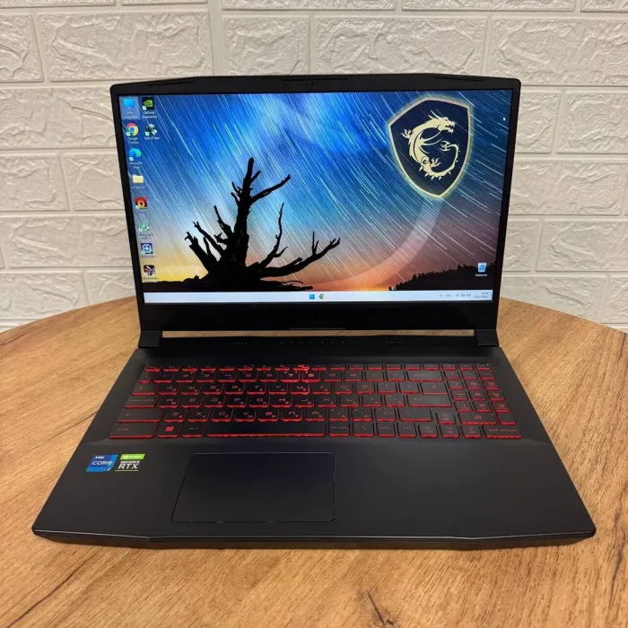Ігровий ноутбук Б-клас MSI Katana GF66 11UE / 15.6" (1920x1080) IPS / Intel Core i7-11800H (8 (16) ядер по 2.3 - 4.6 GHz) / 16 GB DDR4 / 512 GB SSD / nVidia GeForce RTX 3060, 6 GB GDDR6, 192-bit / WebCam б/в - зображення 2