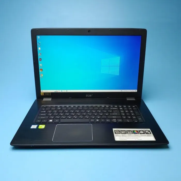 Ігровий ноутбук Acer Aspire E5-774G-52W1 / 17.3" (1920x1080) TN / Intel Core i5-7200U (2 (4) ядра по 2.5 - 3.1 GHz) / 8 GB DDR4 / 256 GB SSD / nVidia GeForce 940MX, 2 GB DDR3, 64-bit / WebCam / Win 10 Home б/в - зображення 2