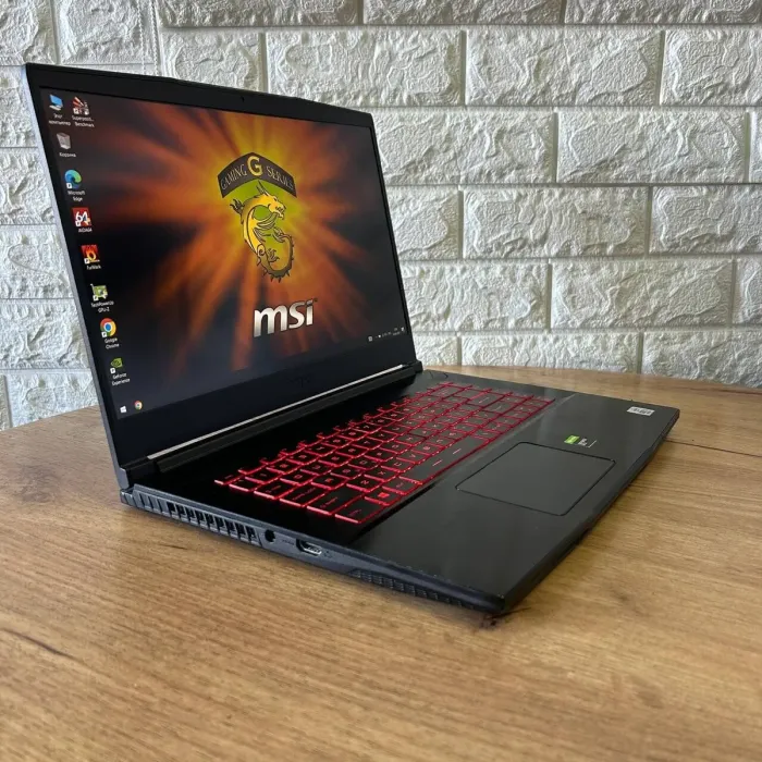Ігровий ноутбук MSI GF65 Thin 10SDR / 15.6" (1920x1080) IPS / Intel Core i7-10750H (6 (12) ядер по 2.6 - 5.0 GHz) / 8 GB DDR4 / 512 GB SSD / nVidia GeForce GTX 1660 Ti, 6 GB GDDR6, 192-bit / WebCam б/в - зображення 4