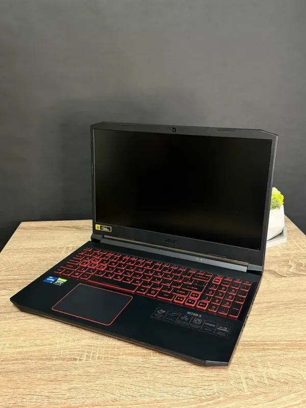 Ігровий ноутбук Б-клас Acer Nitro 5 / 15.6" (1920x1080) IPS / Intel Core i5-11400H (6 (12) ядер по 2.7 - 4.5 GHz) / 16 GB DDR4 / 512 GB SSD M.2 / nVidia GeForce RTX 3050, 4 GB GDDR6, 128-bit / WebCam / Win 11 б/в - зображення 2