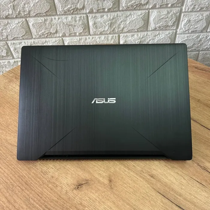 Ігровий ноутбук Б-клас Asus FX503VM / 15.6" (1920x1080) IPS / Intel Core i7-7700HQ (4 (8) ядра по 2.8 - 3.8 GHz) / 16 GB DDR4 / 128 GB SSD M.2 + 1000 GB HDD / nVidia GeForce GTX 1060, 3 GB GDDR5, 192-bit / WebCam б/в - зображення 3