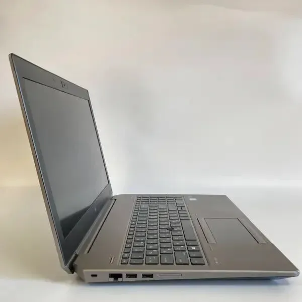 Мобільна робоча станція Б-клас HP ZBook 15 G5 / 15.6" (1920x1080) IPS / Intel Core i7-8850H (6 (12) ядра по 2.6 - 4.3 GHz) / 16 GB DDR4 / 256 GB SSD + 500 GB HDD / nVidia Quadro P1000, 4 GB GDDR5, 256-bit / WebCam / Fingerprint б/в - зображення 4