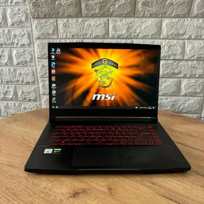 Ігровий ноутбук Б-клас MSI GF65 Thin 10SDR / 15.6" (1920x1080) IPS / Intel Core i7-10750H (6 (12) ядер по 2.6 - 5.0 GHz) / 8 GB DDR4 / 512 GB SSD / nVidia GeForce GTX 1660 Ti, 6 GB GDDR6, 192-bit / WebCam б/в - зображення 2