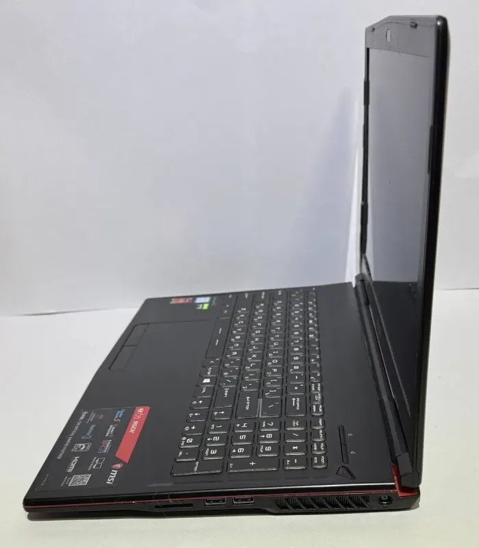 Ігровий ноутбук Б-клас MSI GL63 9SEK / 15.6" (1920x1080) IPS / Intel Core i7-9750H (6 (12) ядер по 2,6 - 4,5 ГГц) / 16 ГБ DDR4 / 256 ГБ SSD + 256 ГБ SSD / nVidia GeForce RTX 2060, 6 ГБ GDDR6, 192-біт / WebCam / Win 11 Pro б/в - изображение 5