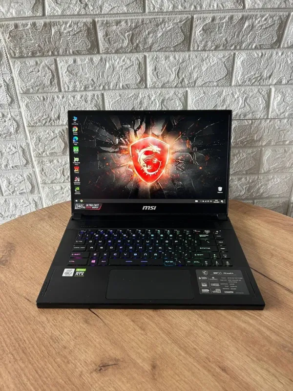 Ігровий ноутбук Б-клас MSI GS66 Stealth 10SF / 15.6" (1920x1080) IPS / Intel Core i7-10750H (6 (12) ядер по 2.6 - 5.0 GHz) / 16 GB DDR4 / 512 GB SSD / nVidia GeForce RTX 2070 Max-Q, 8 GB GDDR6, 256-bit / WebCam б/в - зображення 2