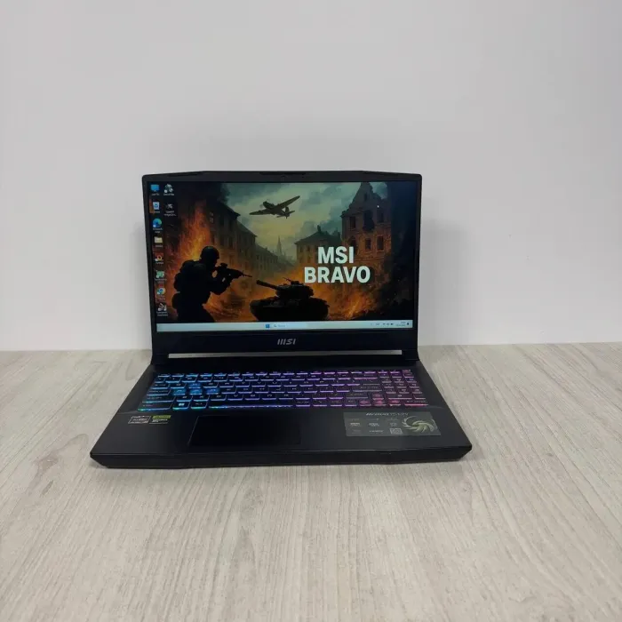 Ігровий ноутбук Б-класу MSI Bravo 15 C7VFK / 15.6" (1920x1080) IPS / AMD Ryzen 7 7735HS (8 (16) ядер по 3.2 - 4.75 GHz) / 16 GB DDR5 / 512 GB SSD NVMe / nVidia GeForce RTX 4060, 8 GB GDDR6, 128-bit / WebCam б/в - зображення 2