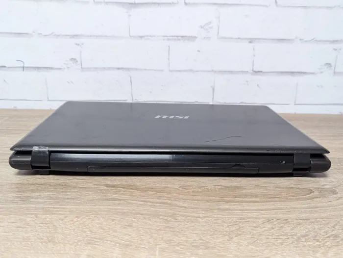 Ноутбук Б-клас MSI CR61 / 15.6" (1366x768) TN / Intel Core i5-3230M (2 (4) ядра по 2.6 - 3.2 GHz) / 8 GB DDR3 / 128 GB SSD / Intel HD Graphics 4000 / WebCam / DVD-ROM б/в - зображення 3