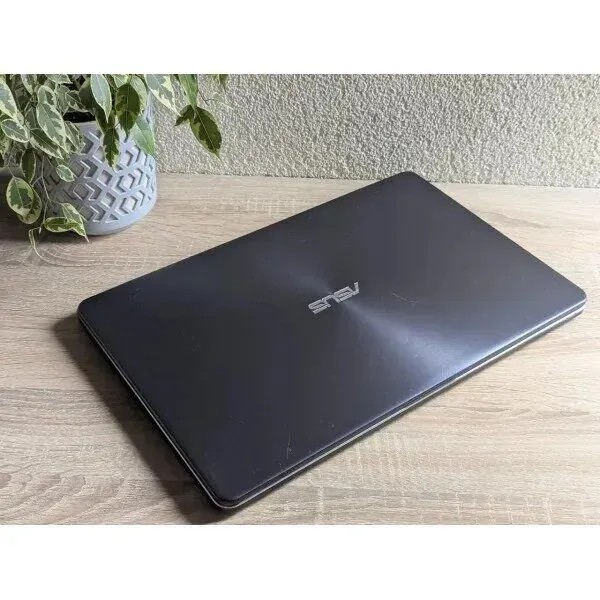 Ноутбук Б-клас Asus VivoBook 17 X705NA / 17.3" (1366x768) TN / Intel Celeron N3350 (2 ядра по 1.1 - 2.4 GHz) / 8 GB DDR3 / 128 GB SSD / Intel HD Graphics 500 / WebCam б/в - зображення 7
