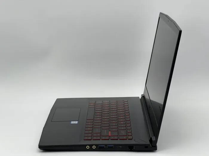 Ігровий ноутбук MSI GF63 8RD / 15.6" (1920x1080) IPS / Intel Core i7-8750H (6 (12) ядер по 2.2 - 4.1 GHz) / 16 GB DDR4 / 480 GB SSD / nVidia GeForce GTX 1050 Ti, 4 GB GDDR5, 128-bit / WebCam б/в - зображення 4