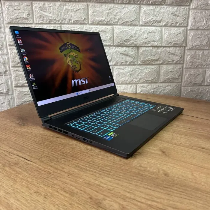 Ігровий ноутбук MSI Stealth 15M A11UEKV / 15.6" (1920x1080) IPS / Intel Core i7-11375H (4 (8) ядра по 3.0 - 5.0 GHz) / 16 GB DDR4 / 512 GB SSD / nVidia GeForce RTX 3060, 6 GB GDDR6, 192-bit / WebCam б/в - зображення 4