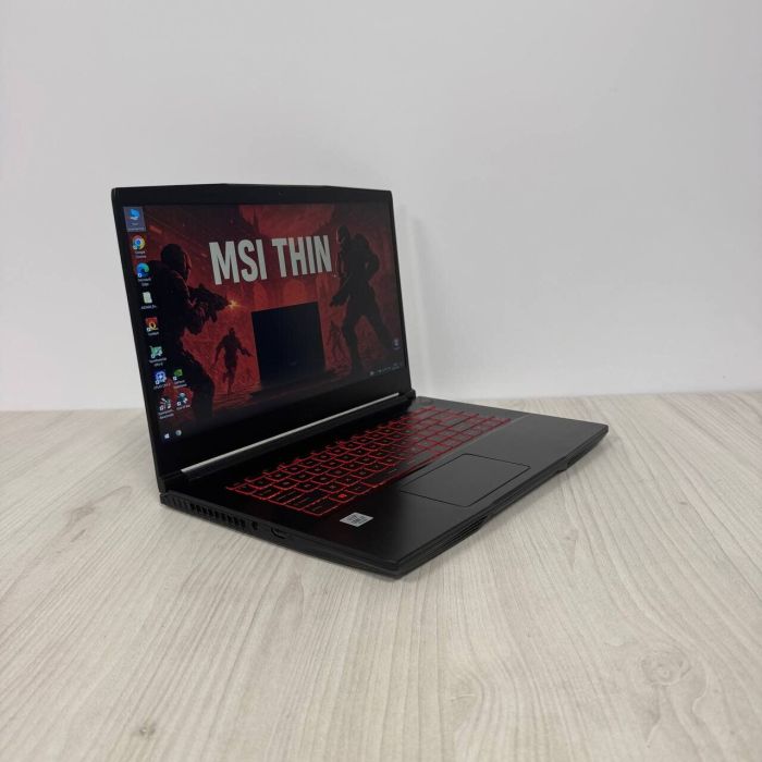 Ігровий ноутбук Б-клас MSI GF65 Thin 10SER / 15.6" (1920x1080) IPS / Intel Core i7-10750H (6 (12) ядер по 2.6 - 5.0 GHz) / 16 GB DDR4 / 512 GB SSD NVMe / nVidia GeForce RTX 2060, 6 GB GDDR6, 192-bit / WebCam б/в - зображення 4